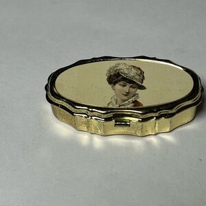 NWOT 2 small metal sewing kits. Woman with hat on top of kit. Perfect for gifts!